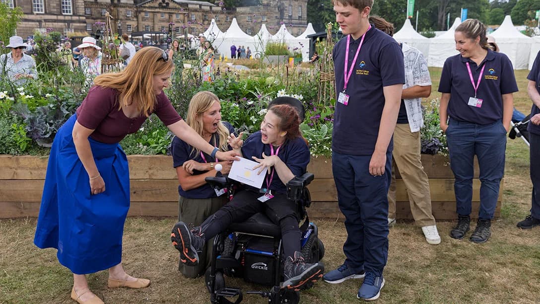 Trent View College students and staff celebrating their RHS Gold Medal at Wentworth Woodhouse Flower Show